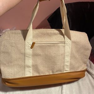 Weekender Bag with shoe compartment. Comes packaged.